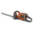 Husqvarna 215iHD45 battery-powered hedgecutter kit with orange and gray design, ergonomic handle, and 45 cm dual-action blade for cordless hedge trimming.