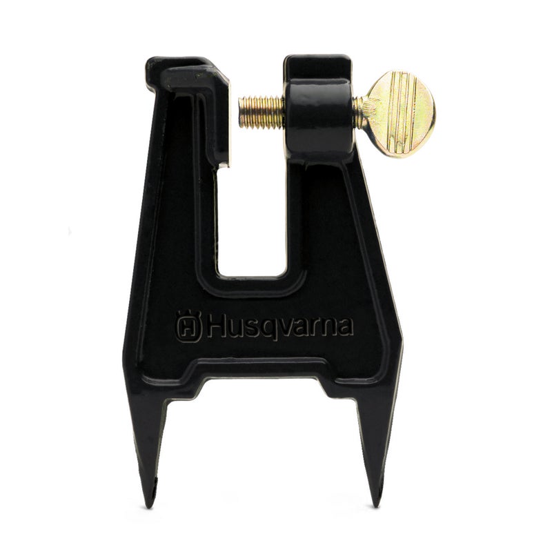 Husqvarna Stump Vice with durable steel construction and pointed base, designed to secure chainsaws for stable sharpening in the field.