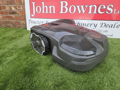 Husqvarna Automower 320 NERA robotic lawn mower on grass, GPS-enabled and weatherproof design