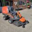 Husqvarna RC 318T Rider lawn mower with 112cm front-mounted cutting deck in action on a large garden lawn