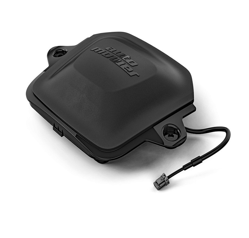 Husqvarna Automower® robotic lawn mower operating on a green lawn with no visible boundary wires, illustrating the wire-free EPOS™ satellite-guided virtual boundary system controlled via the Automower® Connect app