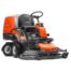Husqvarna RC318T garden tractor with combi 112 cm cutting deck, orange body, ergonomic steering, and efficient mower design for large lawns.