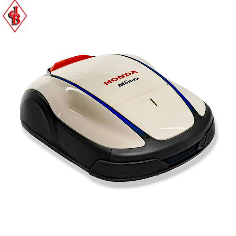 Honda Miimo HRM robotic lawn mower on a neatly trimmed lawn during daytime